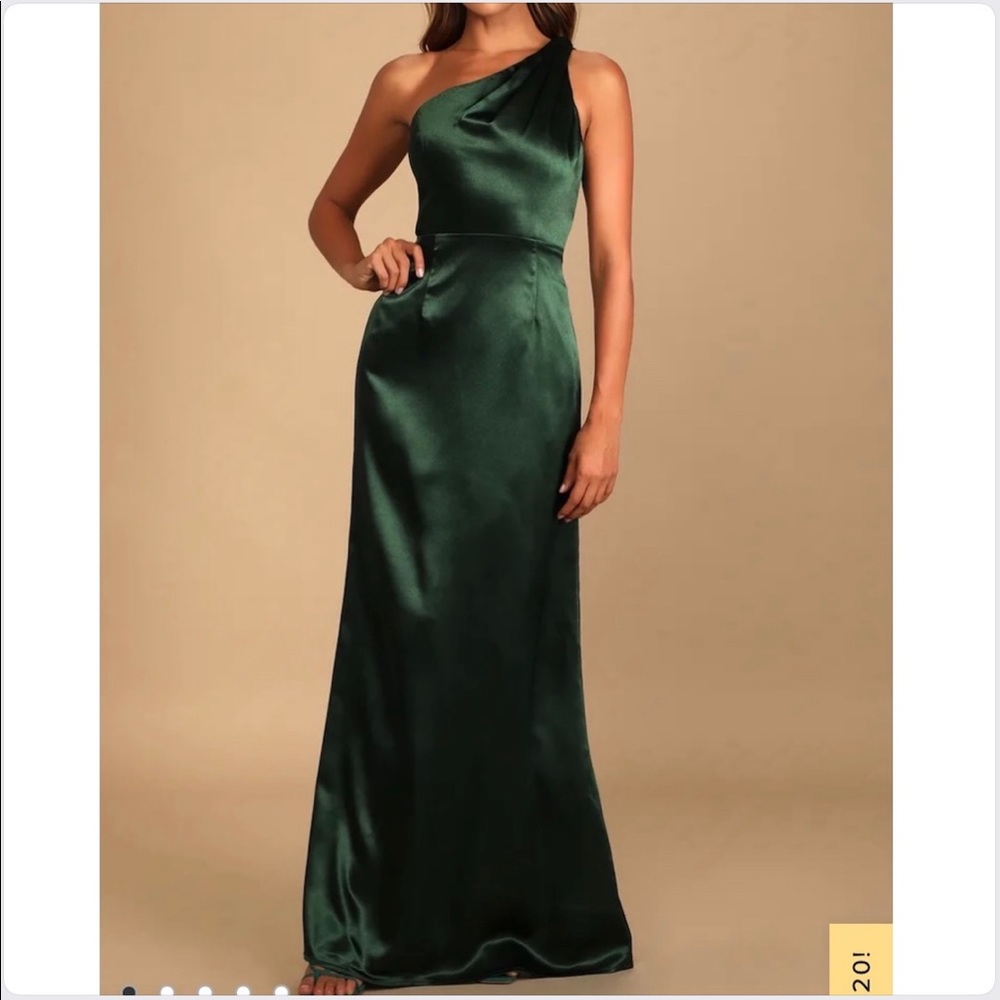 Lulu’s “On the Guest List” dress in emerald green